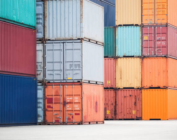 colorful container stacking in depot, modern logistics background